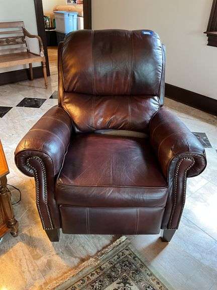 Brown leather recliner w/ tack head trim