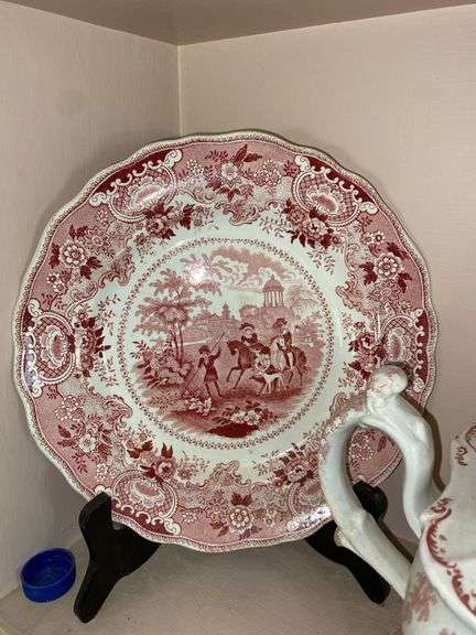 Contents of shelf: red Staffordshire transfer printed teapot, cup plates, plates