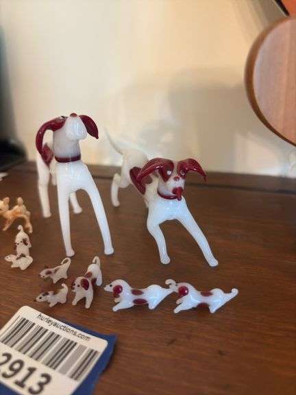 Tiny lampworked glass dog figurine family, and small fawn