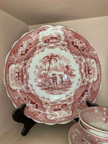 Contents of shelf: red Staffordshire transfer printed china including White Mountain NH scene and Columbus