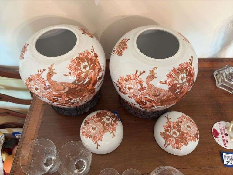 Pair porcelain ginger jars w/ peacock decor, on wooden bases