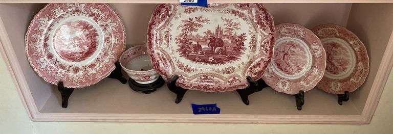 Contents of shelf: red Staffordshire transfer printed platter and plates, including British Lakes pattern