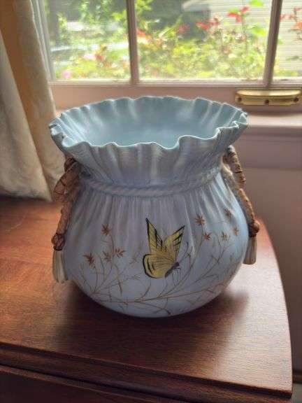 Porcelain vase shaped like draw-string bag, w/ floral and butterfly decor