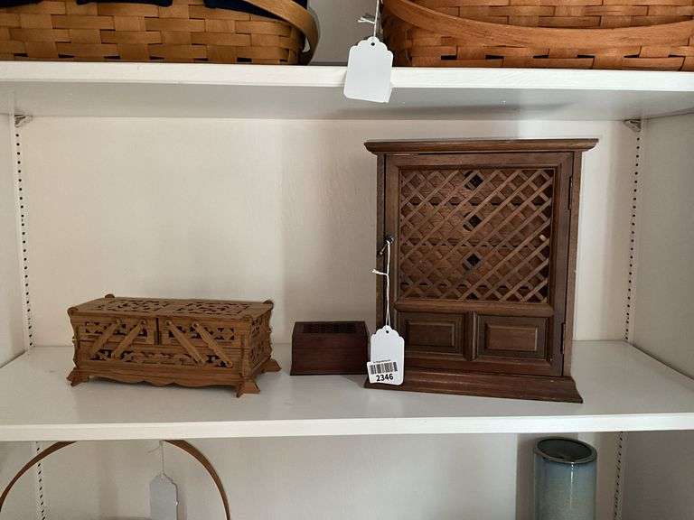 Contents of shelf: jewelry cabinet and two jewelry boxes