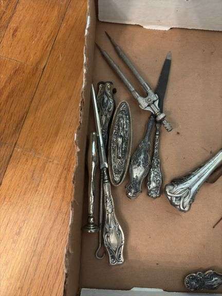 Sterling handled implements including: nail file and buffer, shoehorn, button hooks, letter opener, curling iron