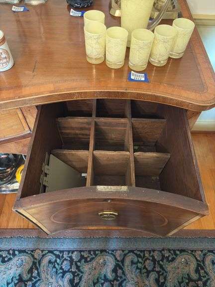 Federal style sideboard, cross banded top and fronts, inlaid ovals, square tapered legs, has bottle drawer - no contents 66x26x38 MUST COME DURING LAST 2 HOURS OF PICKUP FOR THIS ITEM