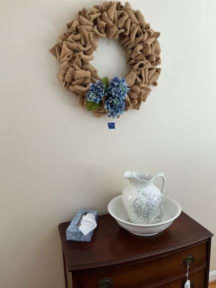Antique china bowl & pitcher, and burlap wreath on wall above