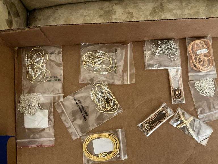 Costume jewelry: chains, necklaces, cross pendant