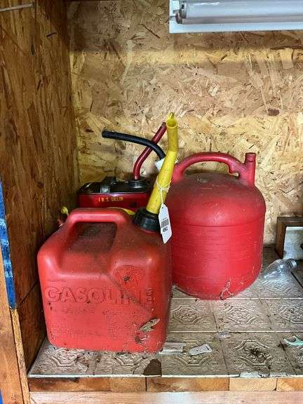 Plastic and metal fuel cans - empty