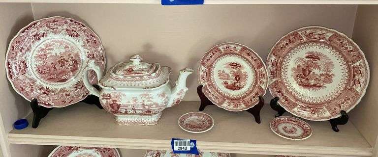 Contents of shelf: red Staffordshire transfer printed teapot, cup plates, plates