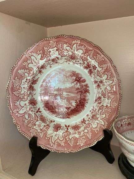 Contents of shelf: red Staffordshire transfer printed platter and plates, including British Lakes pattern