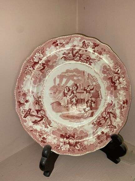 Contents of shelf: red Staffordshire transfer printed plates