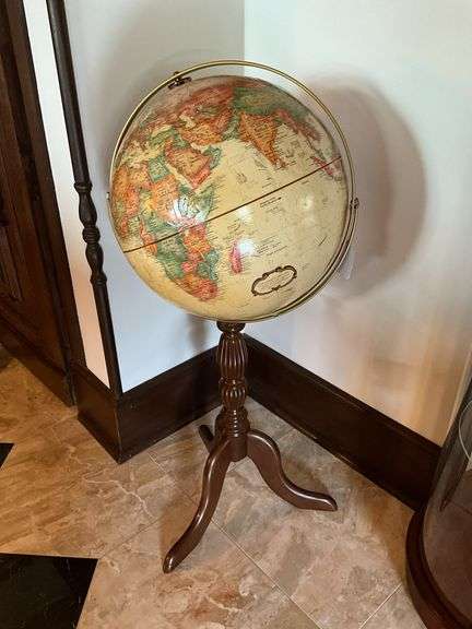World globe on tripod floor stand