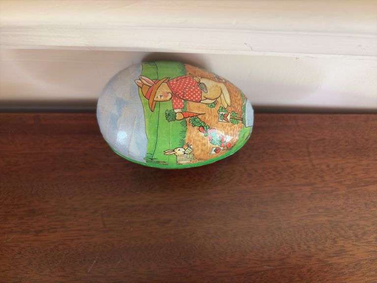 Three cardboard Easter egg candy containers