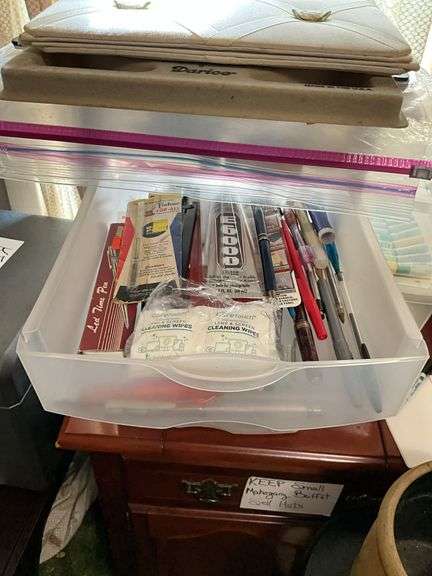 Plastic storage drawers and totes w/ craft supply contents