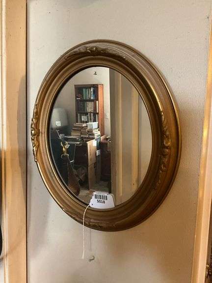 Wall hangings: oval gilt mirror 18x16, and bisque plaque w/ figures in relief