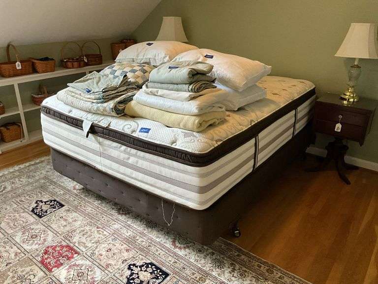 Bed w/ Beauty Rest mattress and linens on bed 58x80