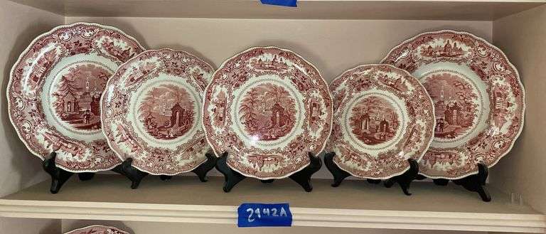 Contents of shelf: red Staffordshire transfer printed Spanish Convent pattern plates