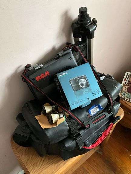 Fuji AV200 camera in box, RCA Camcorder video camera w/ tripod, binoculars