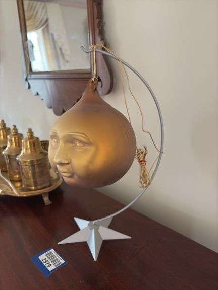 Man-in-the-Moon ornament on stand