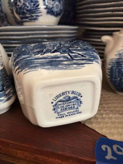 Contents of two shelves: Liberty Blue Historic Colonial Scenes dinnerware set w/ serving pcs
