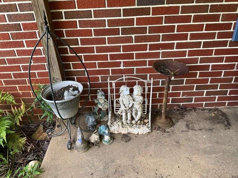 Garden figures, birdbath, planter stand, and shepherd's hooks