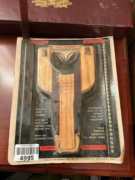 Wham-O wooden slingshot in package, playing card decks in decorative box