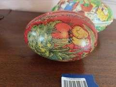 Three cardboard Easter egg candy containers