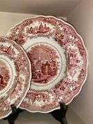 Contents of shelf: red Staffordshire transfer printed Spanish Convent pattern plates