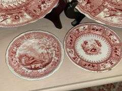 Contents of shelf: red Staffordshire transfer printed teapot, cup plates, plates