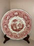 Contents of shelf: red Staffordshire transfer printed plates