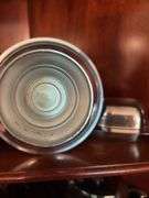 Contents of shelf: pewter serving pcs