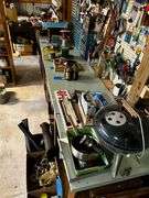 Large workbench (11ft) with doors and shelves, no contents, ***MUST come during last 2 hours of picked up to retrieve this item.