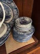 Contents of two shelves: Liberty Blue Historic Colonial Scenes dinnerware set w/ serving pcs