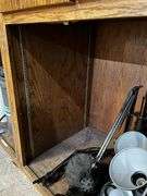 Large workbench (11ft) with doors and shelves, no contents, ***MUST come during last 2 hours of picked up to retrieve this item.