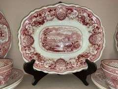 Contents of shelf: red Staffordshire transfer printed china including White Mountain NH scene and Columbus