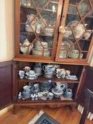 Federal style corner cupboard w/ central eagle finial, glazed top doors over cupboard base, inlaid stringing, French bracket feet - no contents 43x23x94 MUST COME DURING LAST 2 HOURS OF PICKUP FOR THIS ITEM