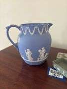 Blue Wedgwood jasperware pitcher, and green jasperware box