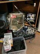 Corner desk and contents: desk accessoroies, CDs, brief cases, cables, misc