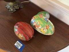 Three cardboard Easter egg candy containers