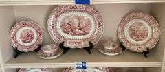 Contents of shelf: red Staffordshire transfer printed china platter, plates, cup/saucer, including Caledonia pattern