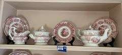 Contents of shelf: red Staffordshire transfer printed china teapot, sugar & creamer, plates