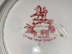 Contents of shelf: red Staffordshire transfer printed china teapot, sugar & creamer, plates