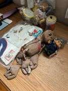 E.T. doll, Beauty and the Beast figures, troll doll, Mickey Mouse t-shirt, Billy beer can