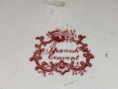 Contents of shelf: red Staffordshire transfer printed Spanish Convent pattern plates