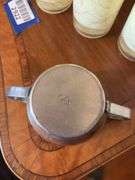 Contents of shelf: pewter serving pcs