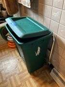 Contents of bathroom except fur coats: collectibles, health items, boots, cleaning supplies, misc