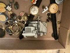 Wrist watches by Gervais Penard, Timex, truck belt buckle, lapel pins, misc