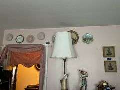 Wall hangings: milk glass Cupid & Psyche plate, bisque plaques, handpainted porcelain plates, two framed needlepoints