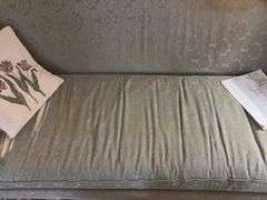 Camel back sofa and throw pillows - note upholstery shows wear - flag not included 72in long